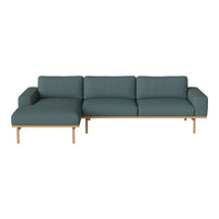 Teal fabric sectional sofa with a modern design and light wooden legs, perfect for contemporary living spaces.
