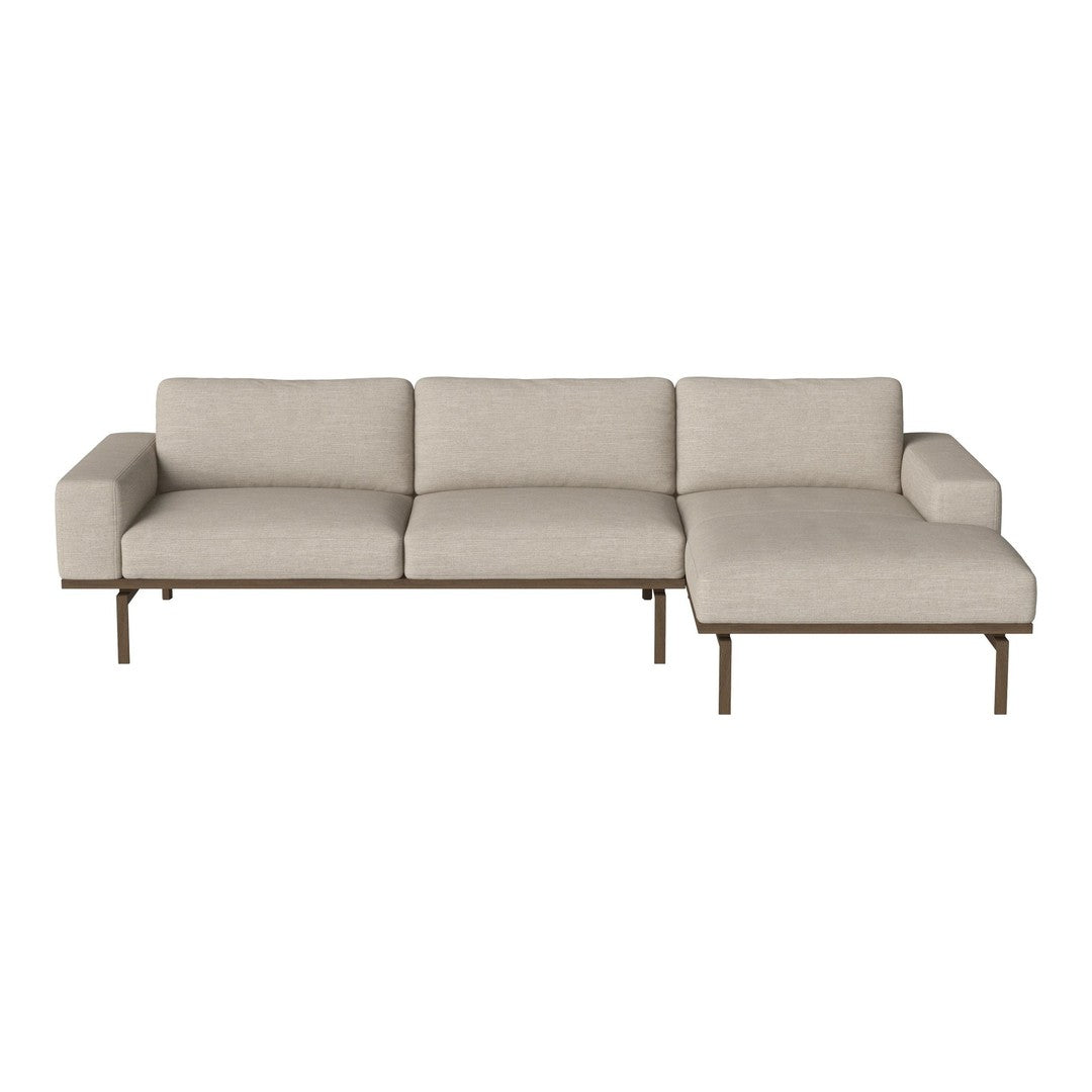 Light beige sofa with a sleek, minimalist design and solid metal legs. Perfect for modern living spaces.