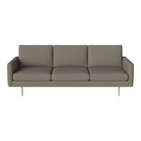 Gray mid-century modern sofa with clean lines and wooden legs, ideal for contemporary living spaces.