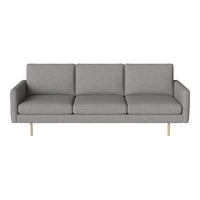 Modern gray sofa with clean lines and subtle texture, featuring light wood legs for a contemporary look.