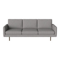 Modern gray sofa with a minimalist design and smooth fabric upholstery, featuring straight lines and subtle texture.