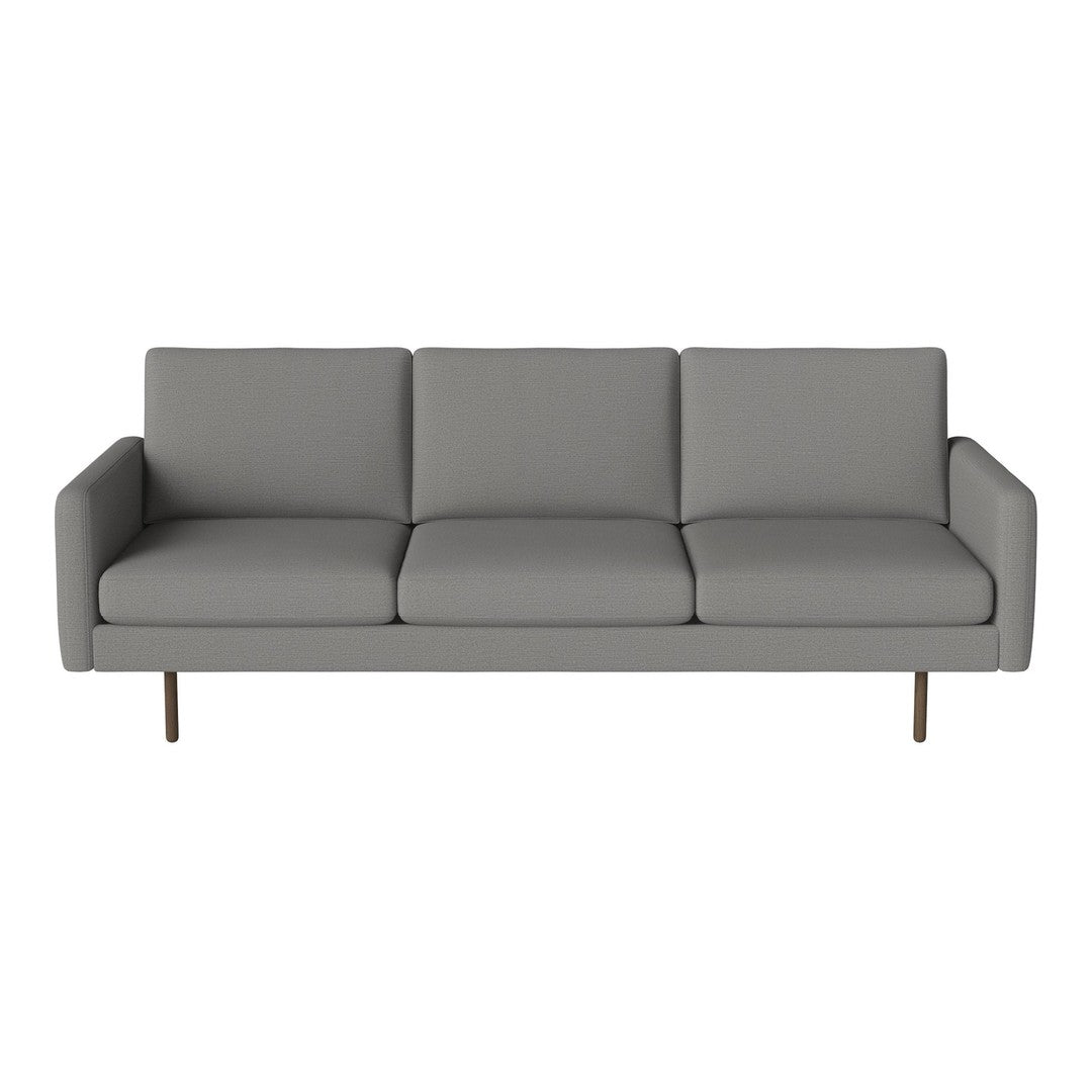 Modern gray sofa with clean lines and a minimalist design, featuring plush upholstery and sleek metal legs.