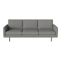 Modern gray sofa with clean lines and a minimalist design, featuring plush upholstery and sleek metal legs.