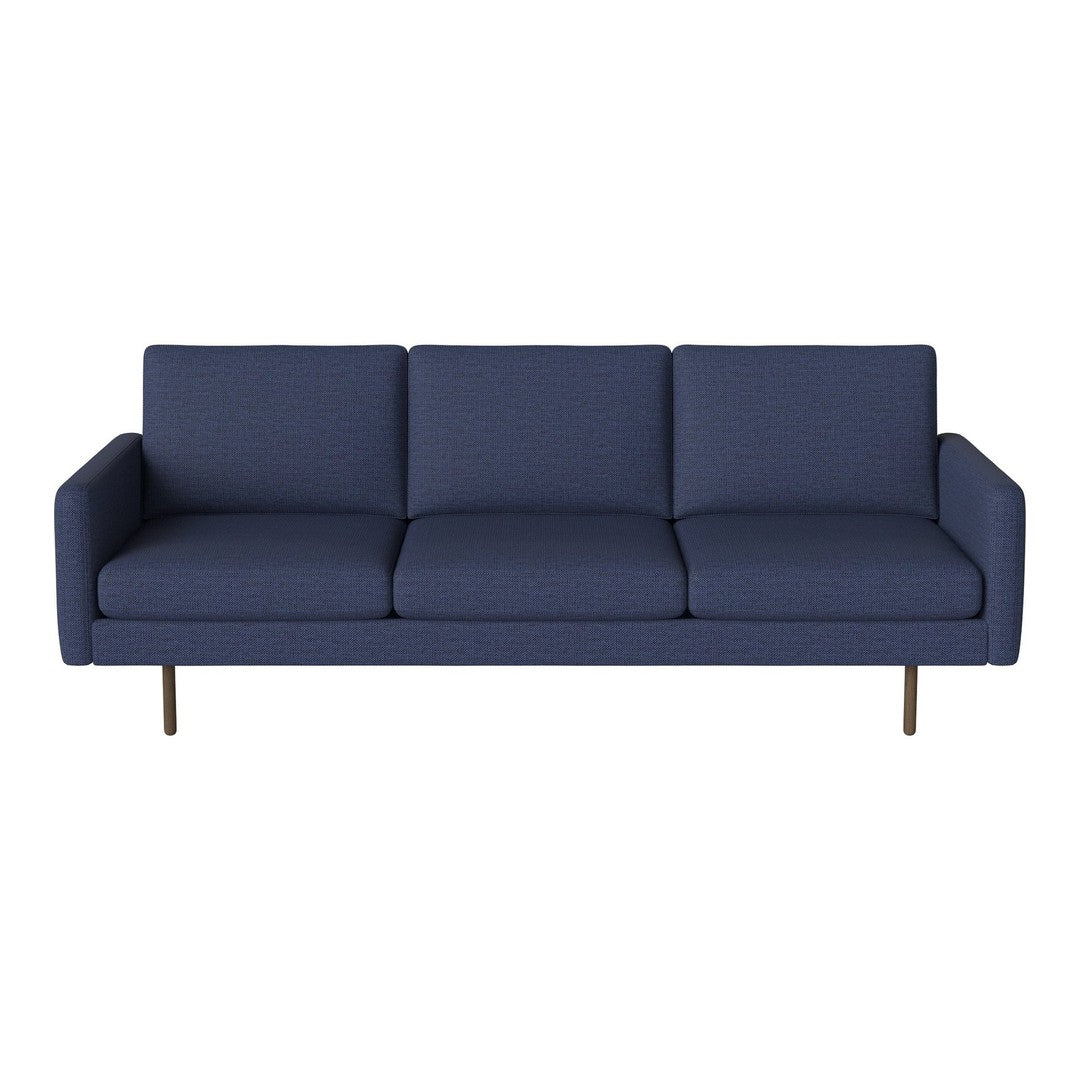 Navy blue sofa with a modern design, featuring a smooth texture and minimalist style. Perfect for contemporary decor.