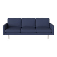 Navy blue sofa with a modern design, featuring a smooth texture and minimalist style. Perfect for contemporary decor.