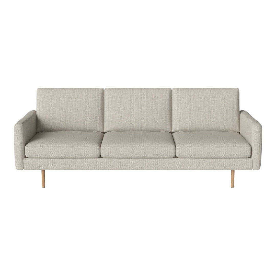 Light gray modern sofa with clean lines and minimalist design, featuring a subtle textured fabric.