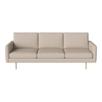 Beige three-seater sofa with clean lines and a smooth fabric texture, complemented by light wooden legs.