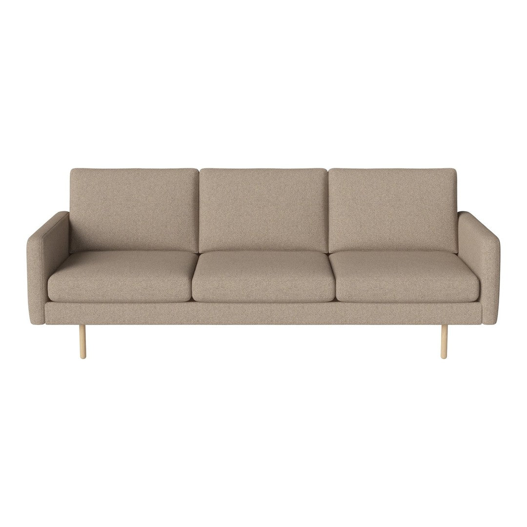 Beige three-seater sofa with a minimalist design and smooth texture, featuring subtle stitching details.