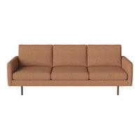 Stylish mid-century modern sofa in a warm brown hue with a textured fabric and sleek metal legs.