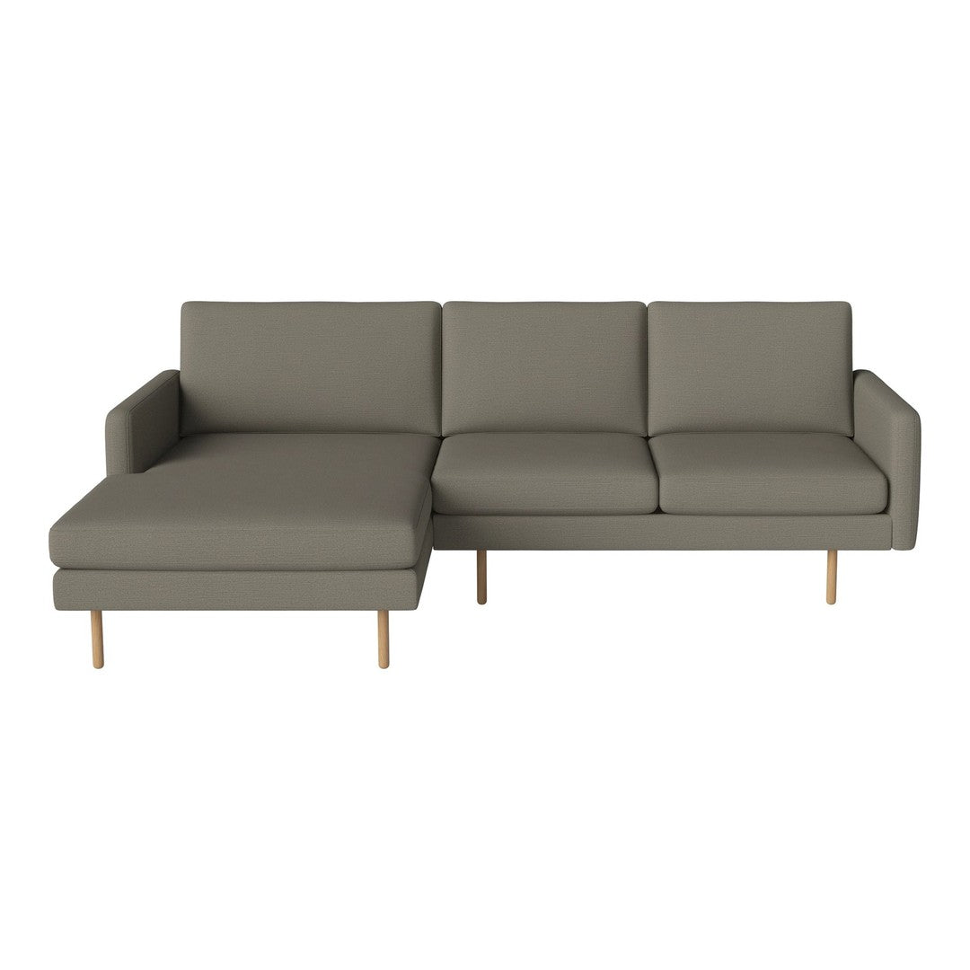 Grey sectional sofa with clean lines and minimalist design, featuring solid wood legs. Ideal for modern interiors.
