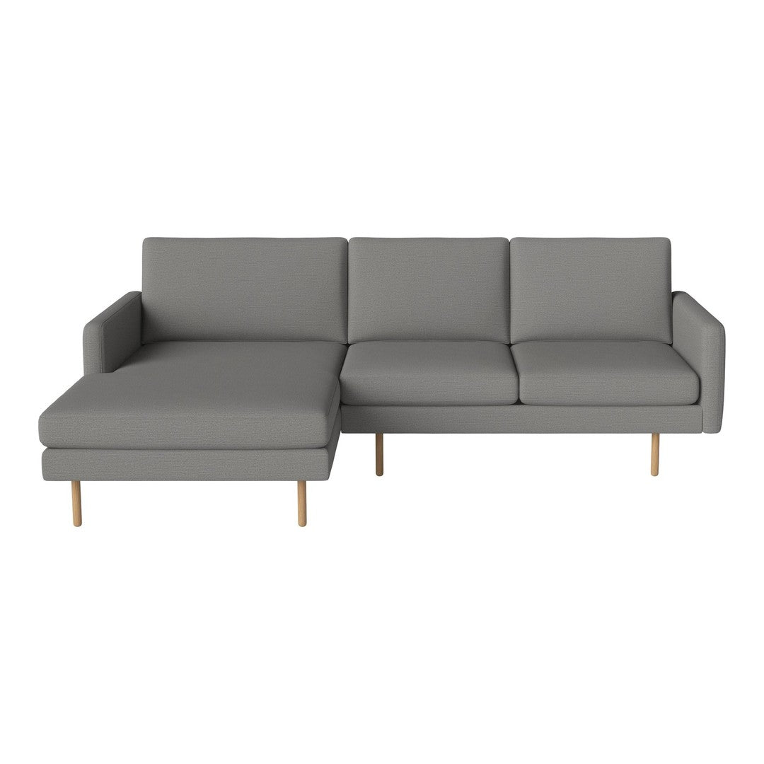 Gray fabric sectional sofa with a minimalist design and natural wood legs, offering a modern touch to any living space.