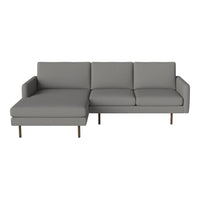 Gray modern sectional sofa with clean lines and minimalistic design, featuring smooth upholstery and gold legs.