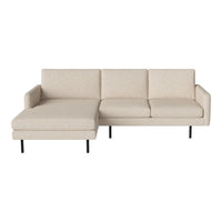Beige sectional sofa with a subtle textured pattern and black metal legs. Modern design for stylish living spaces.
