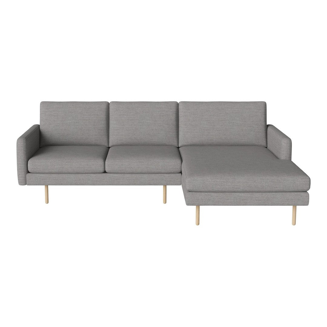 Gray upholstered sectional sofa with minimalist design and light wooden legs, perfect for modern living spaces.