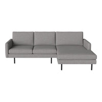 Modern gray sectional sofa with a sleek, minimalist design and clean lines, perfect for contemporary living spaces.