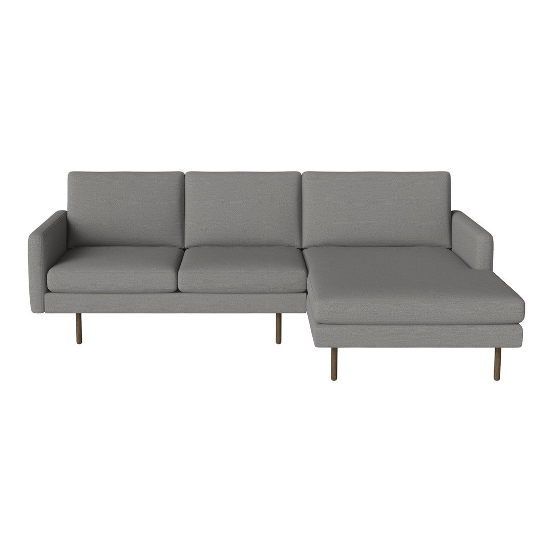 Modern gray sectional sofa with clean lines and minimalist design, featuring a plush fabric finish and sleek metal legs.