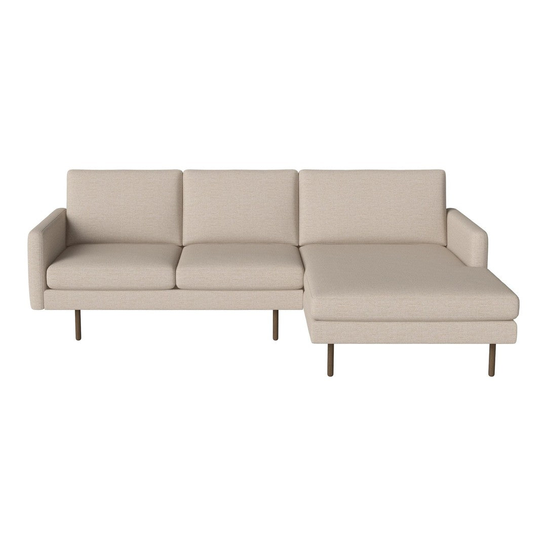 Beige sectional sofa with a minimalist design and smooth upholstery, featuring clean lines and sleek metal legs.