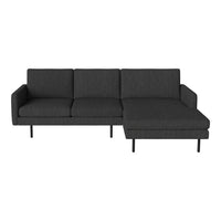 Modern charcoal gray sectional sofa with a sleek fabric pattern and minimalist design. Ideal for contemporary spaces.