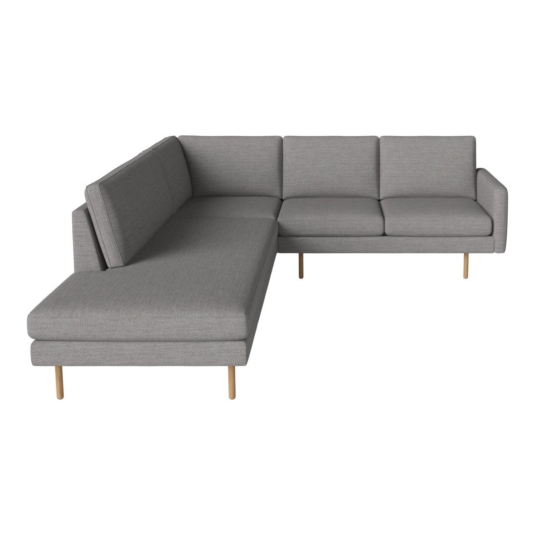 Gray sectional sofa with clean lines and subtle texture, featuring light wood legs for a modern touch.