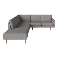 Gray sectional sofa with clean lines and subtle texture, featuring light wood legs for a modern touch.