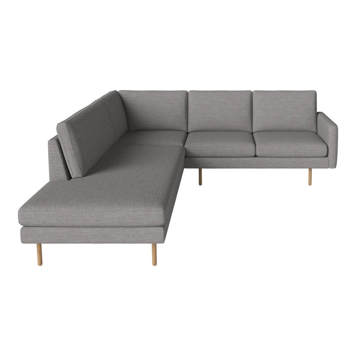 Gray sectional sofa with clean lines and subtle texture, featuring light wood legs for a modern touch.