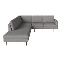 Gray L-shaped sectional sofa with clean lines and minimalistic design, featuring subtle texture on the fabric upholstery.