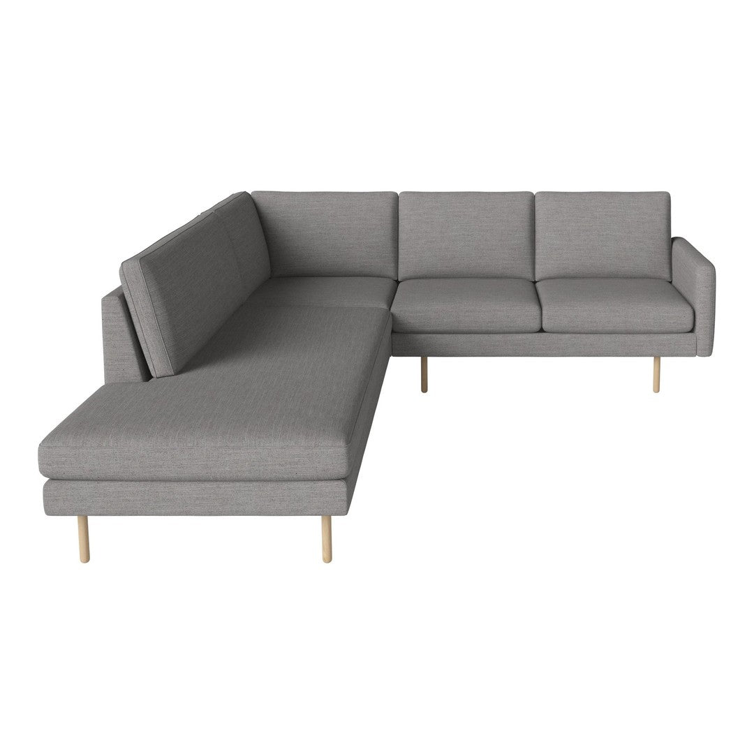 Gray fabric sectional sofa with clean lines and minimalist design, featuring light wooden legs for a modern touch.