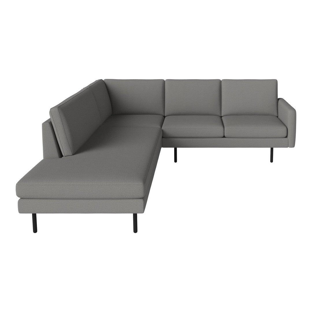 Gray modern sectional sofa with clean lines and no visible patterns, featuring sleek black legs.
