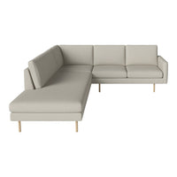 Light gray sectional sofa with clean lines and minimalistic design, featuring natural wood legs.