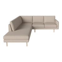 Beige sectional sofa with clean lines and minimalist design, featuring smooth fabric and light wooden legs.