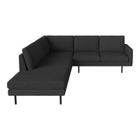 Modern L-shaped sofa in dark gray upholstery with a clean, minimalist design and subtle textured fabric.