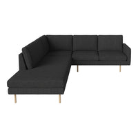 Stylish dark gray sectional sofa with a smooth texture and elegant wooden legs, perfect for modern living spaces.