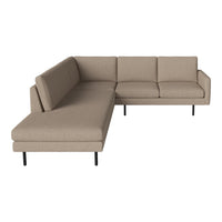 Beige sectional sofa with a minimalist design, featuring a smooth, textured fabric and black metal legs.