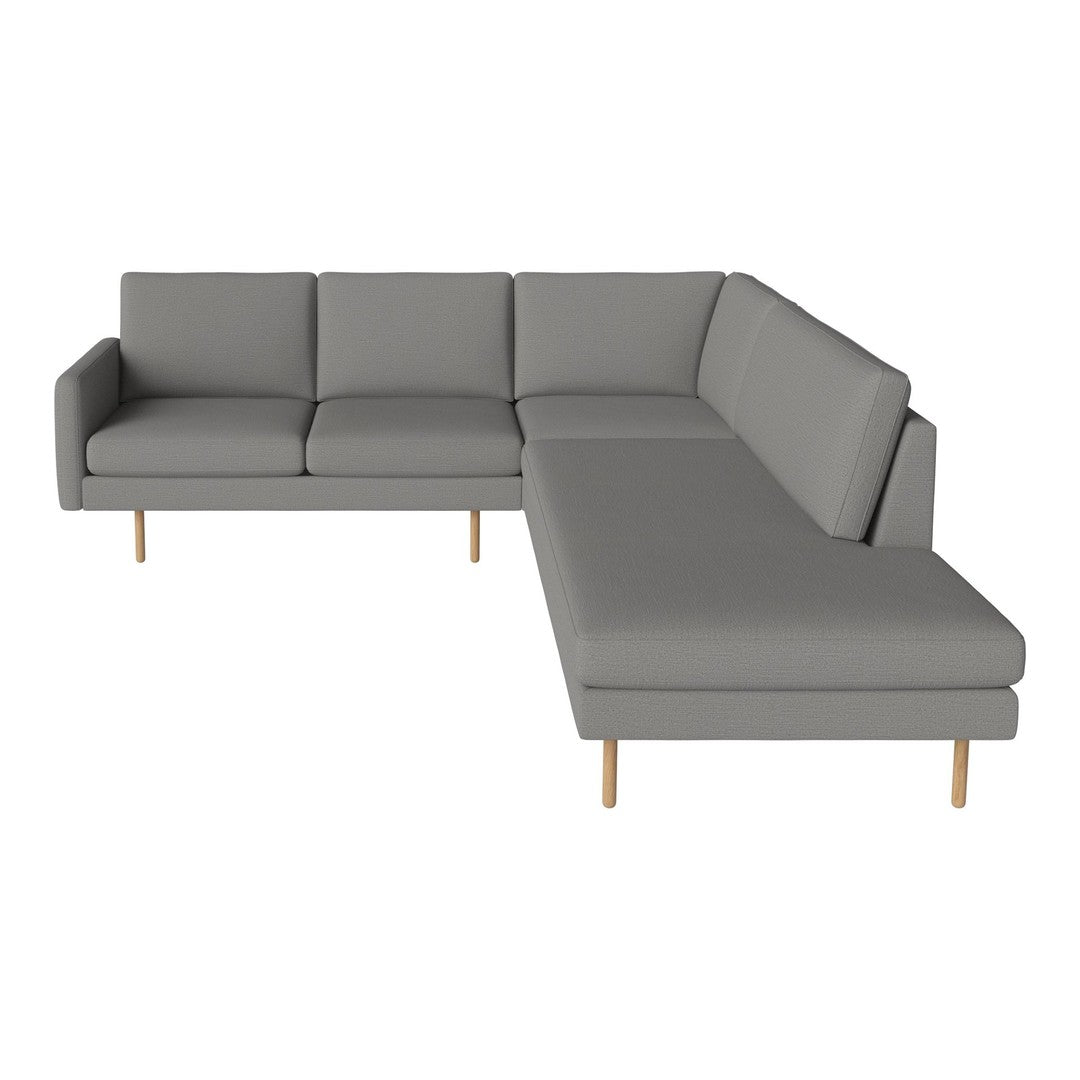 Gray sectional sofa with clean lines and subtle texture, featuring light wooden legs for a modern touch.