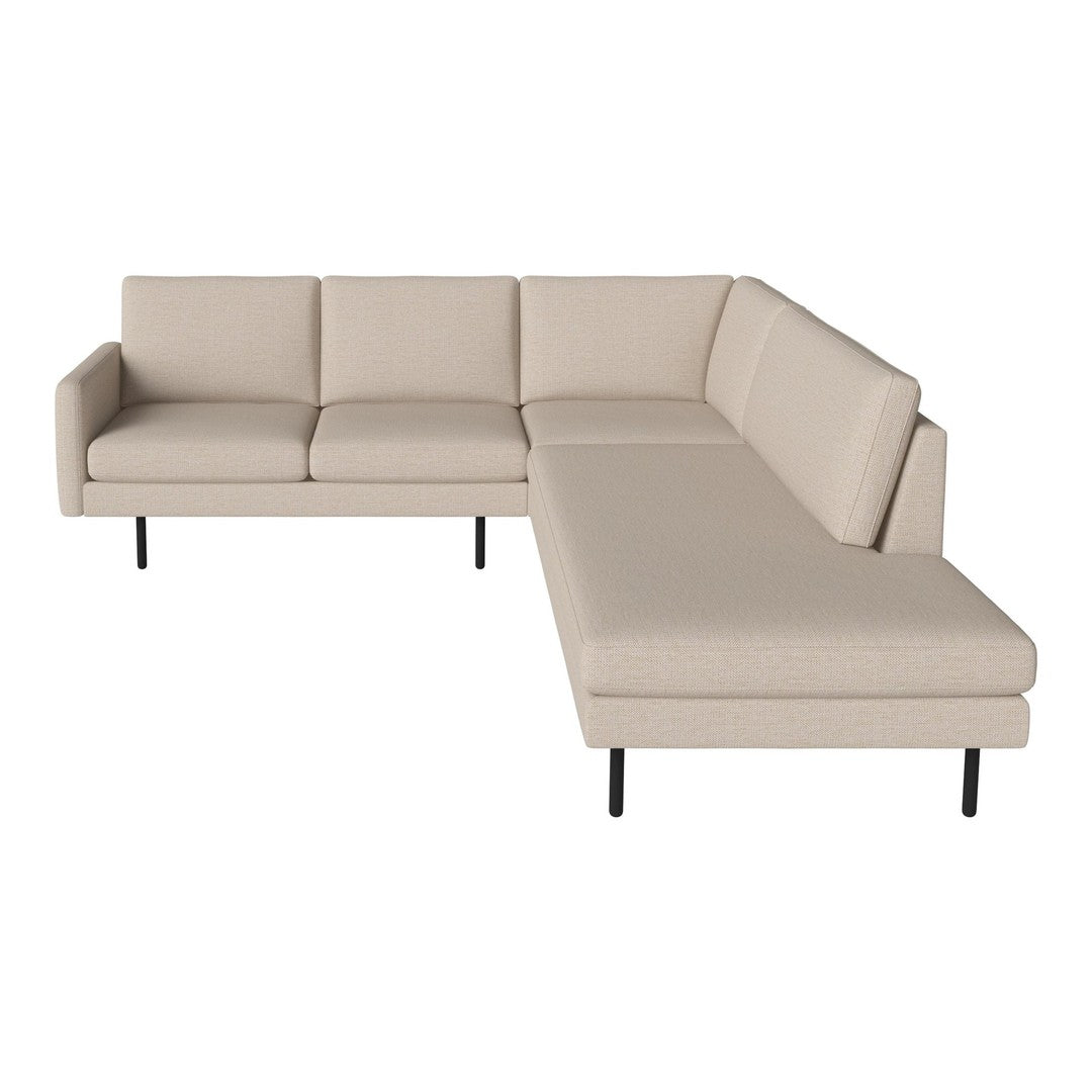 Beige modern sectional sofa with clean lines and minimalist design, featuring smooth, solid upholstery and black legs.