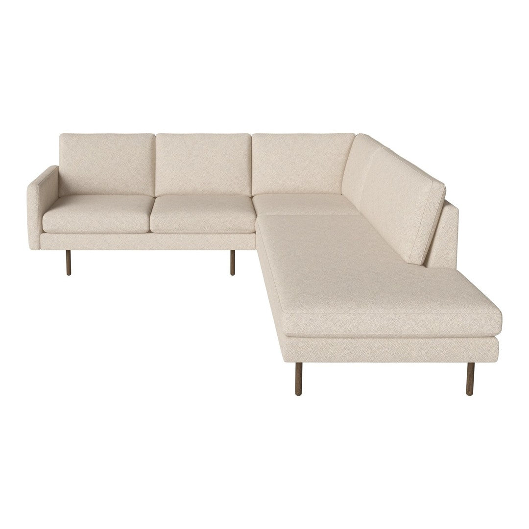 Beige sectional sofa with a smooth fabric texture and sleek, modern design. Ideal for contemporary living spaces.