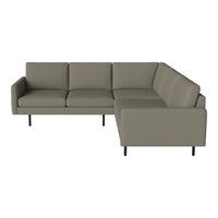 Gray sectional sofa with sleek lines and smooth fabric, featuring a minimalist design and subtle tones.