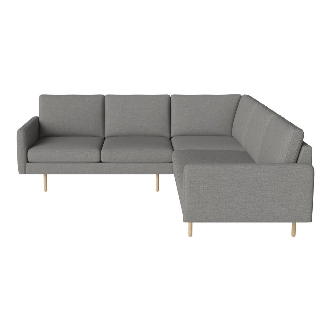 Stylish gray sectional sofa with sleek lines and wooden legs, perfect for modern living spaces.