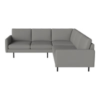 Modern gray sectional sofa with clean lines, minimalist design, and sleek black legs, perfect for contemporary spaces.