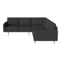 "Modern dark gray sectional sofa with clean lines and natural wood legs, featuring a textured fabric."