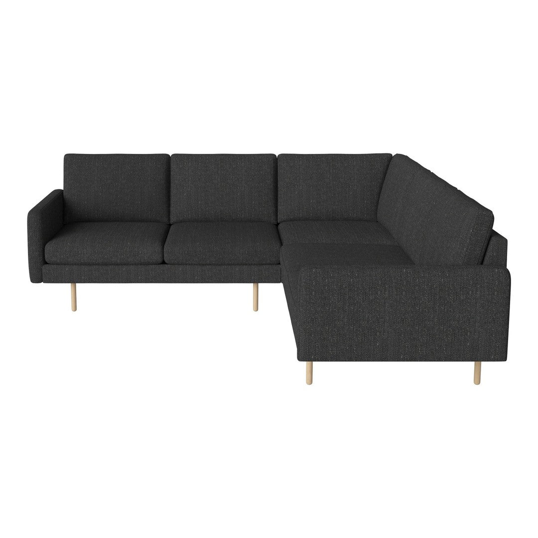 Dark gray sectional sofa with sleek lines and a textured fabric finish, complemented by light wooden legs.