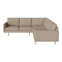 Beige sectional sofa with a minimalist design and clean lines, featuring a textured fabric and wooden legs.