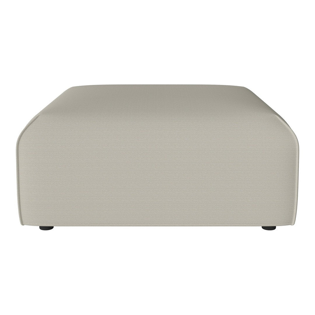 Light beige ottoman with a smooth, minimalist design, perfect for contemporary decor.