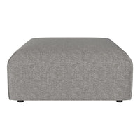 Gray upholstered ottoman with a textured fabric and seamless, modern design. Perfect for contemporary decor.