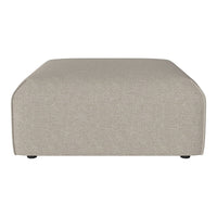 Beige upholstered ottoman with a smooth, minimalist design and subtle texture, perfect for any modern decor.