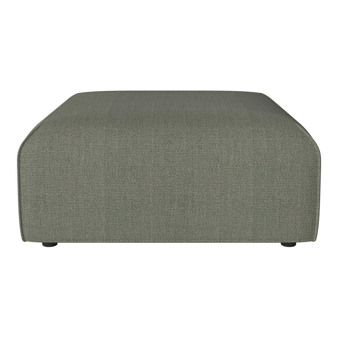 Green textured ottoman with a modern, minimalist design and rounded edges, perfect for stylish living spaces.