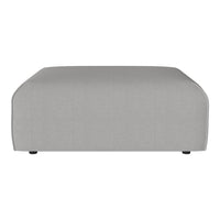 Gray fabric ottoman with a smooth, minimalist design and subtle curved edges, ideal for modern decor.