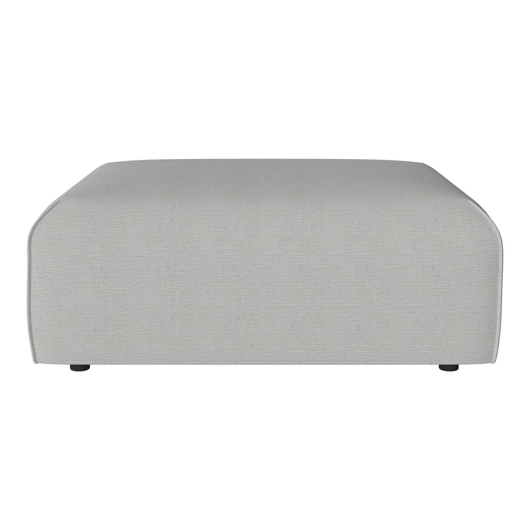 Gray rectangular ottoman with a smooth fabric surface and rounded edges, perfect for modern interiors.