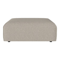 Light beige textured ottoman with a minimalistic design and smooth, rounded edges. Perfect for modern decor.