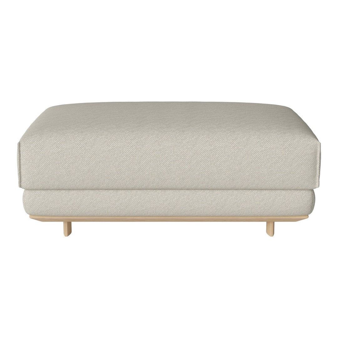 Light gray upholstered ottoman with a smooth texture and minimalist wooden legs, perfect for modern decor.